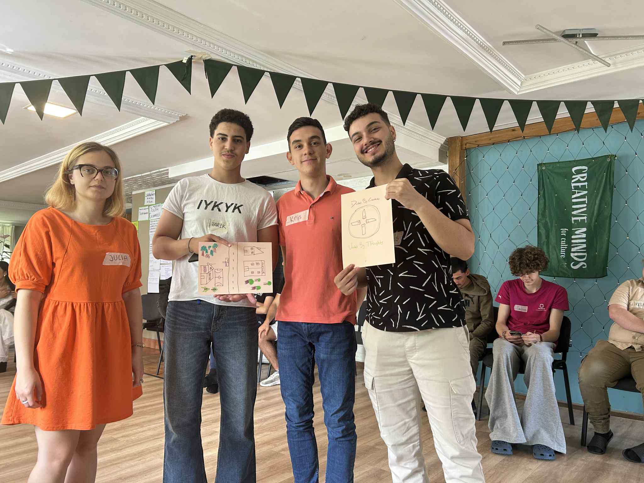 a person standing on a ledge overlooking a town