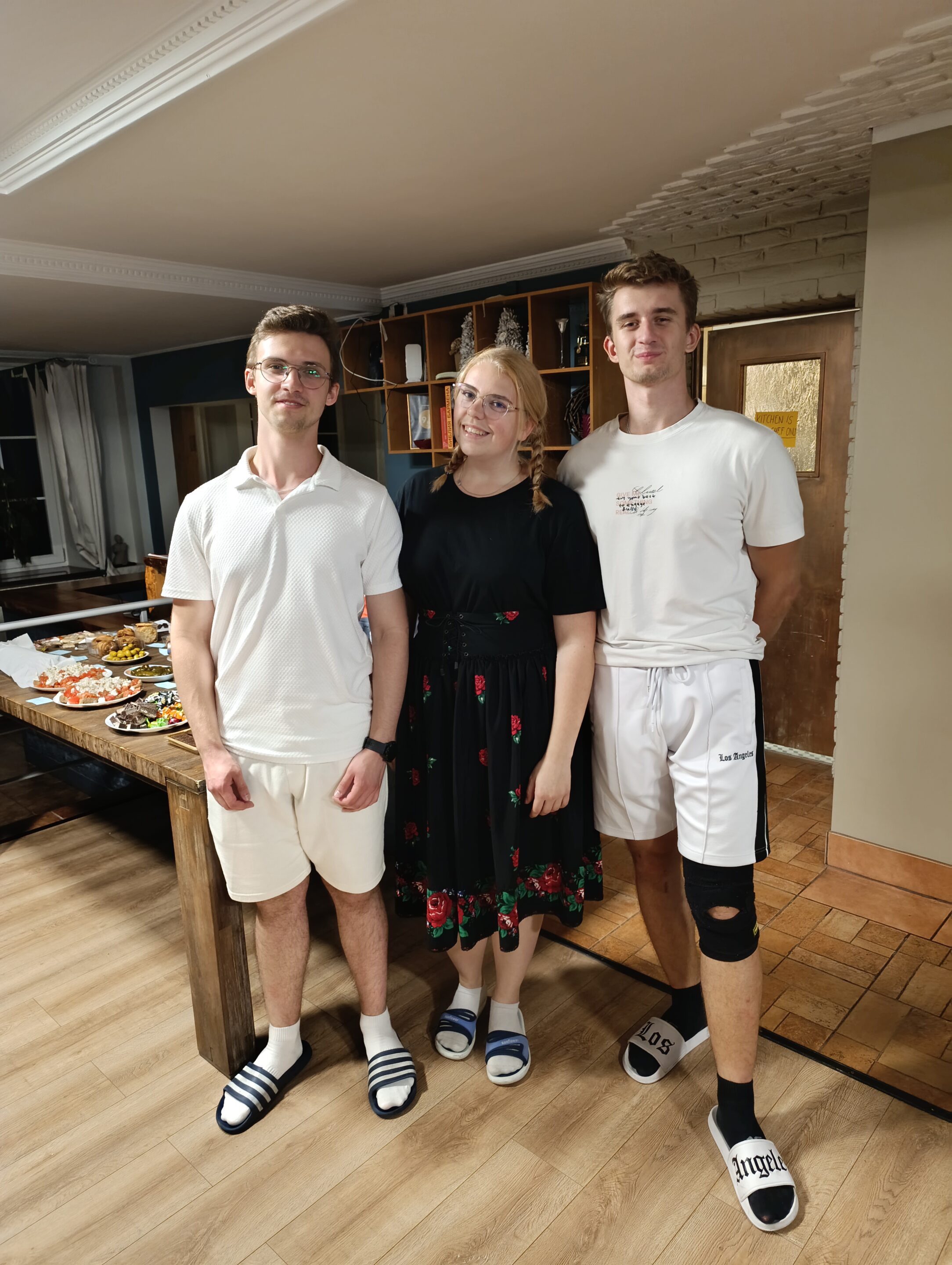 a person standing on a ledge overlooking a town